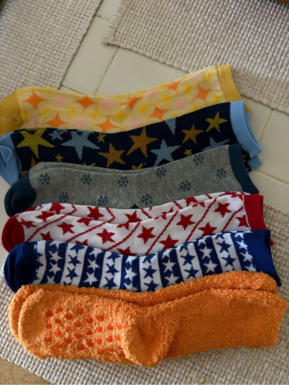 6 pairs of multi colored women’s socks.